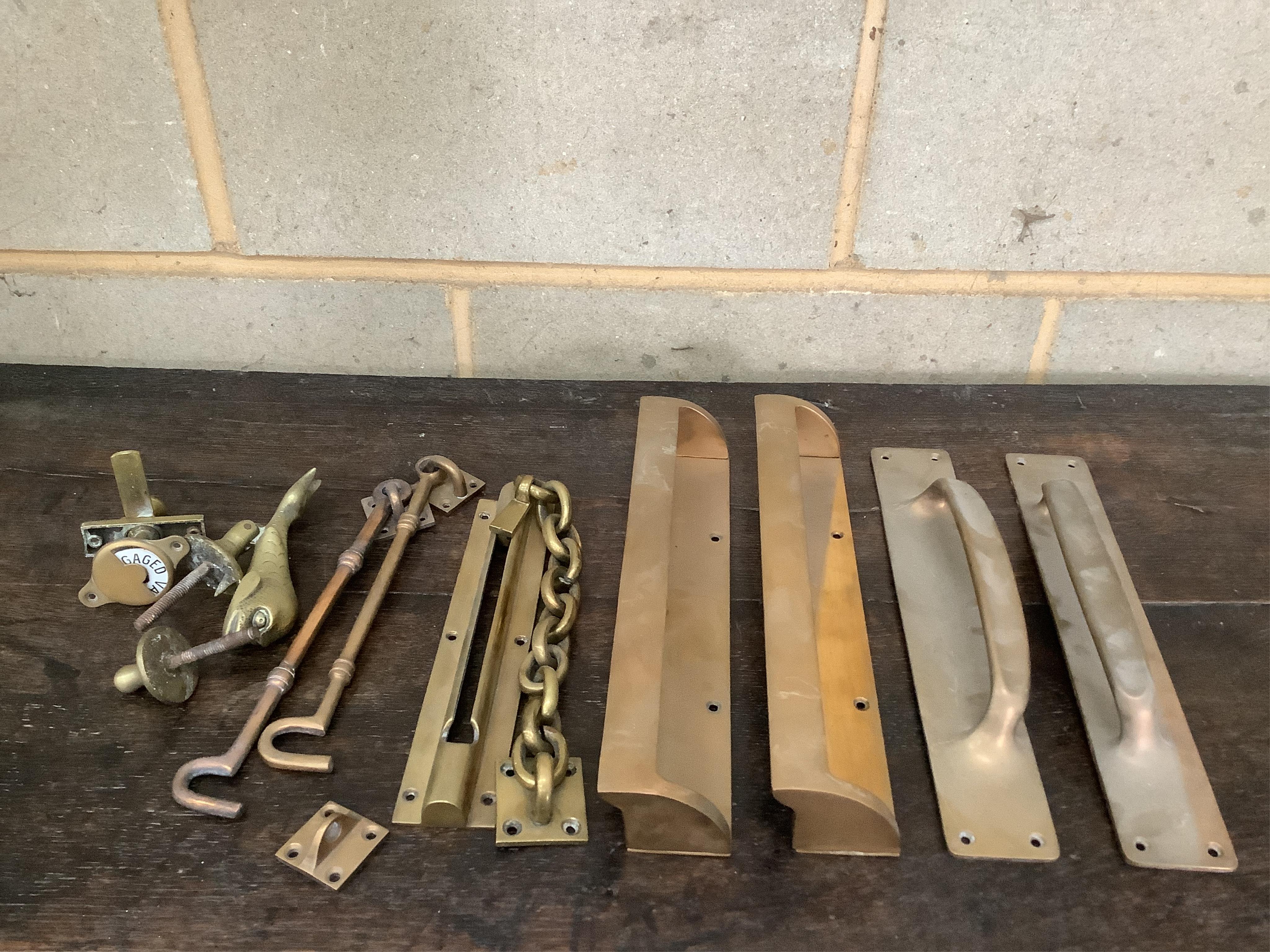 A small quantity of brass door furniture